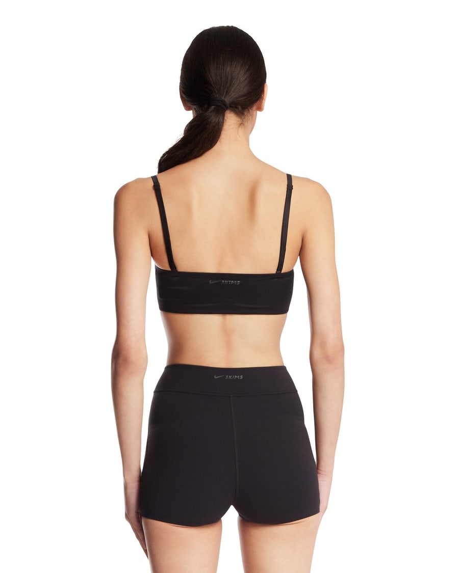 Nike NikeSKIMS Top Studio Stretch Nero, view 5