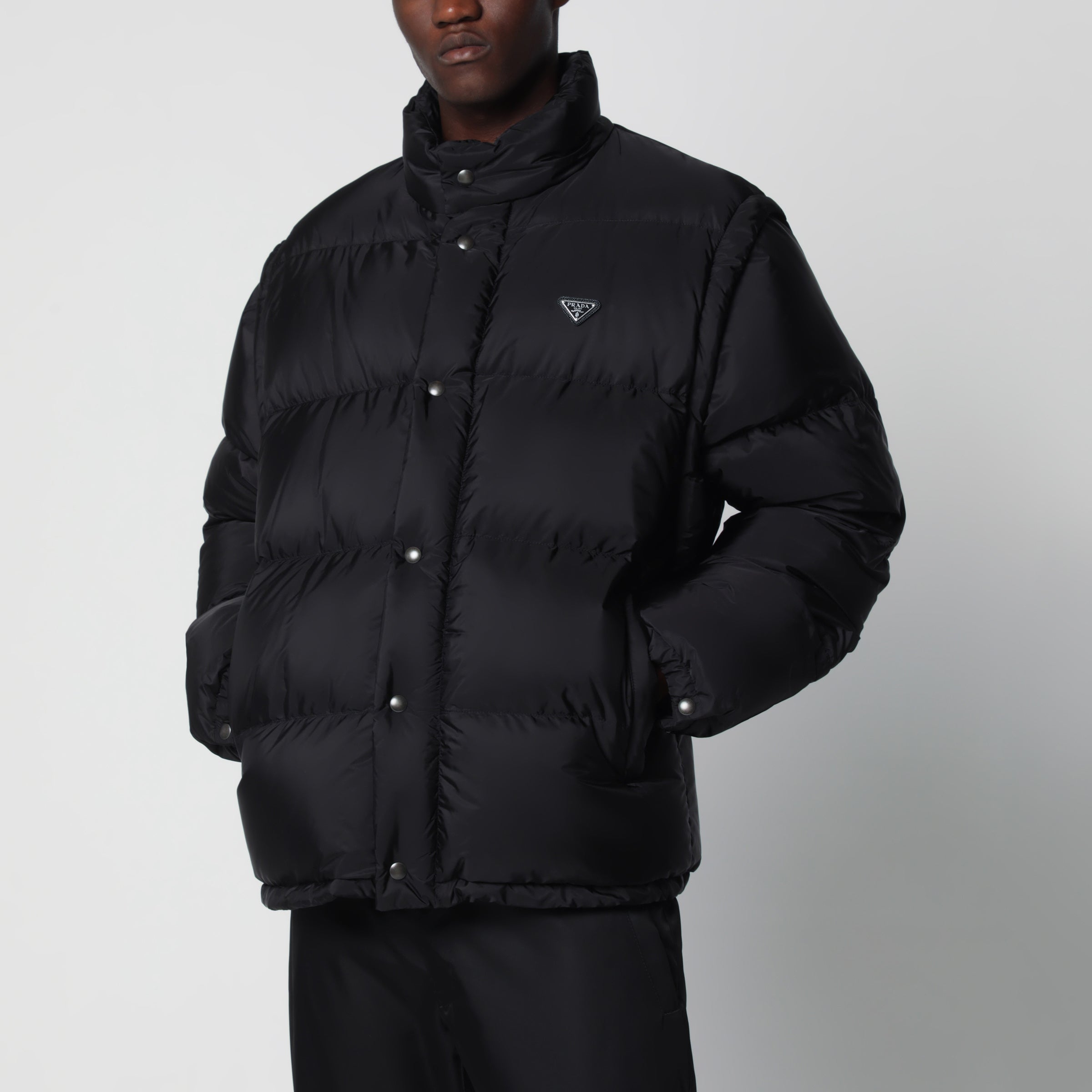 Prada Piumino trasformabile nero in Re-Nylon