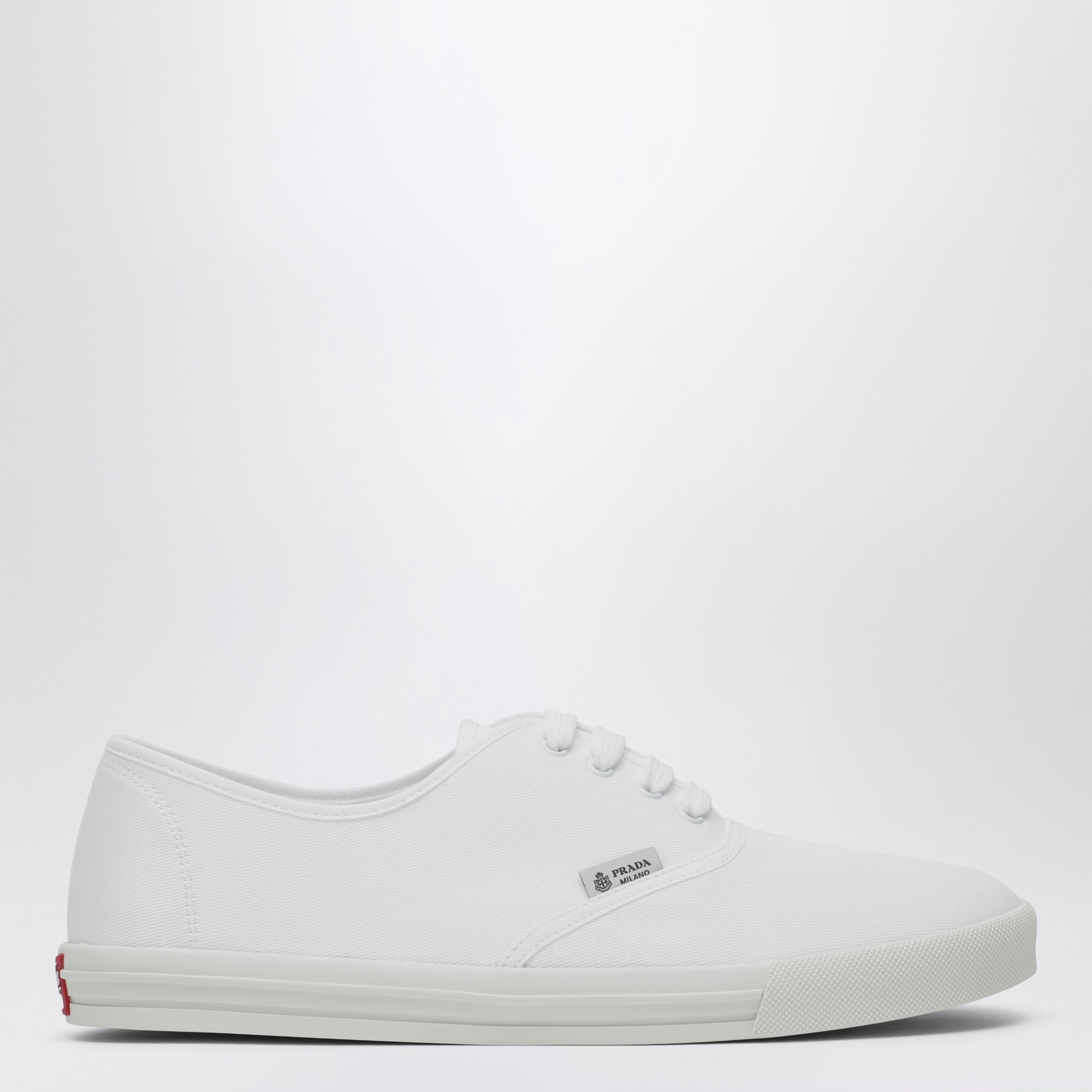 Prada Sneakers in tessuto drill bianca