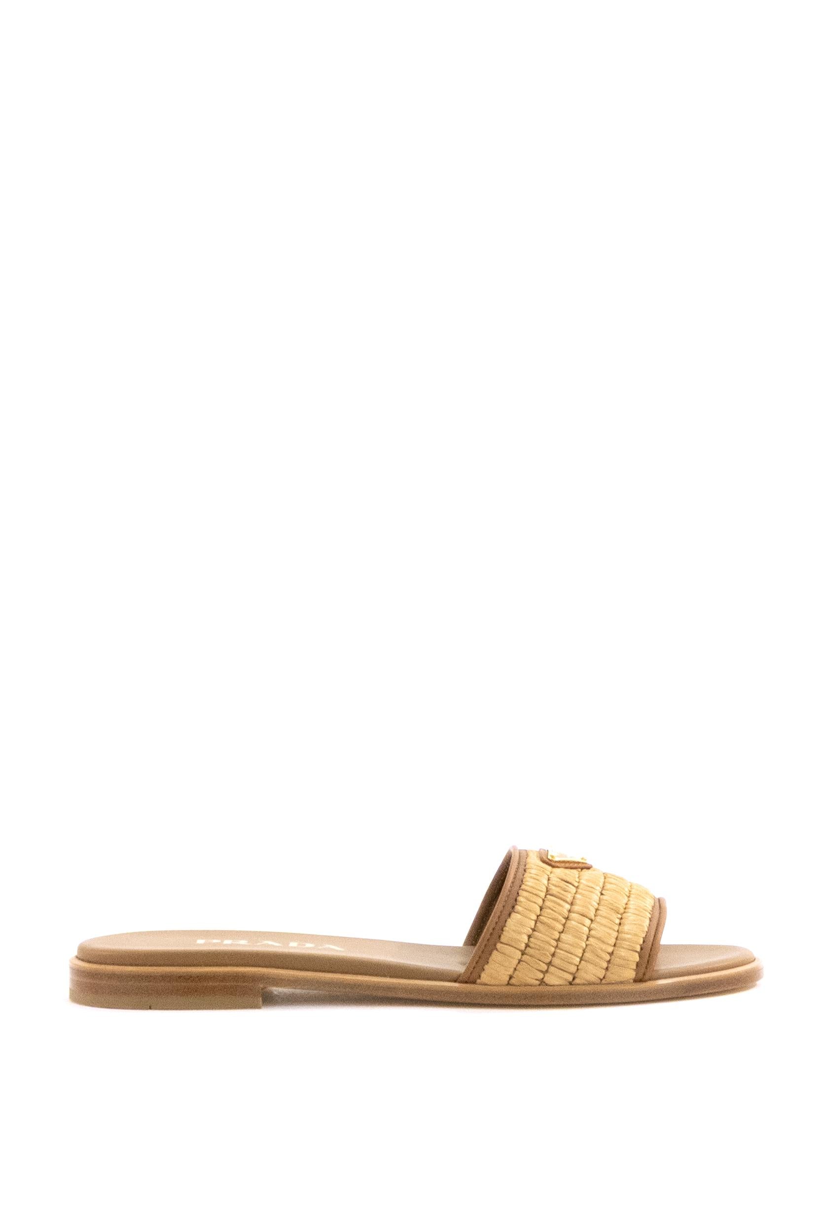 Prada Sandali slider in pelle di colore marrone e crochet di colore beige