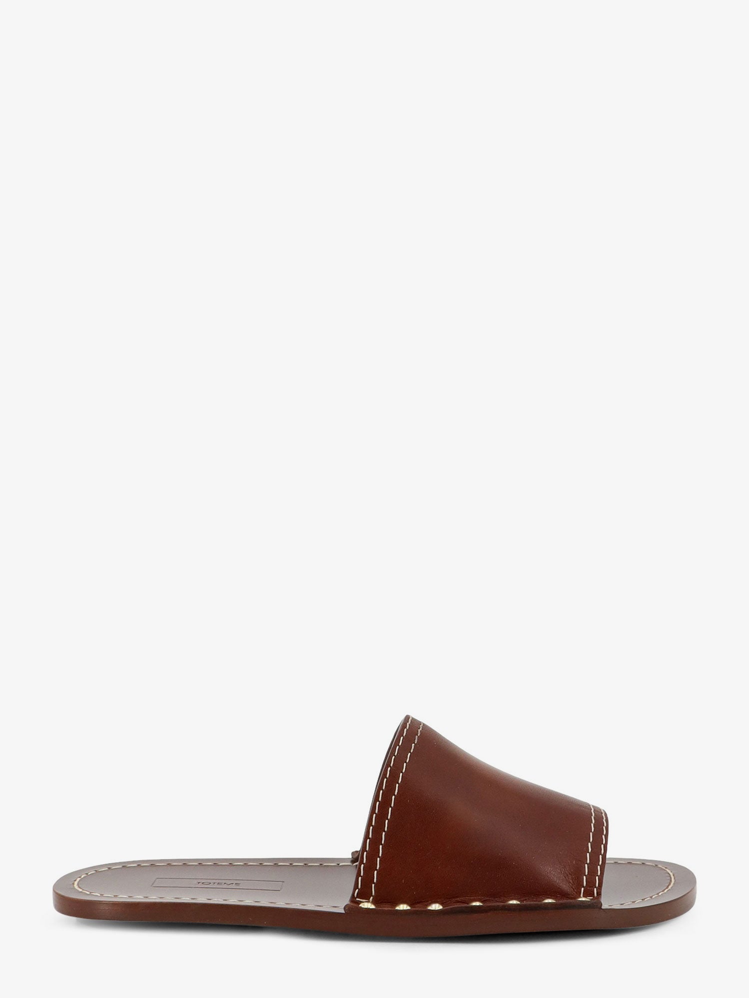 Toteme Low leather sandals with metal studs on the sides