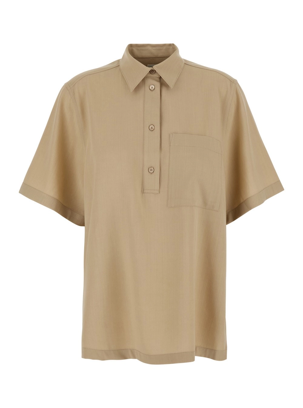 Toteme Polo oversize con colletto classico e maniche corte ampie in misto lana beige donna