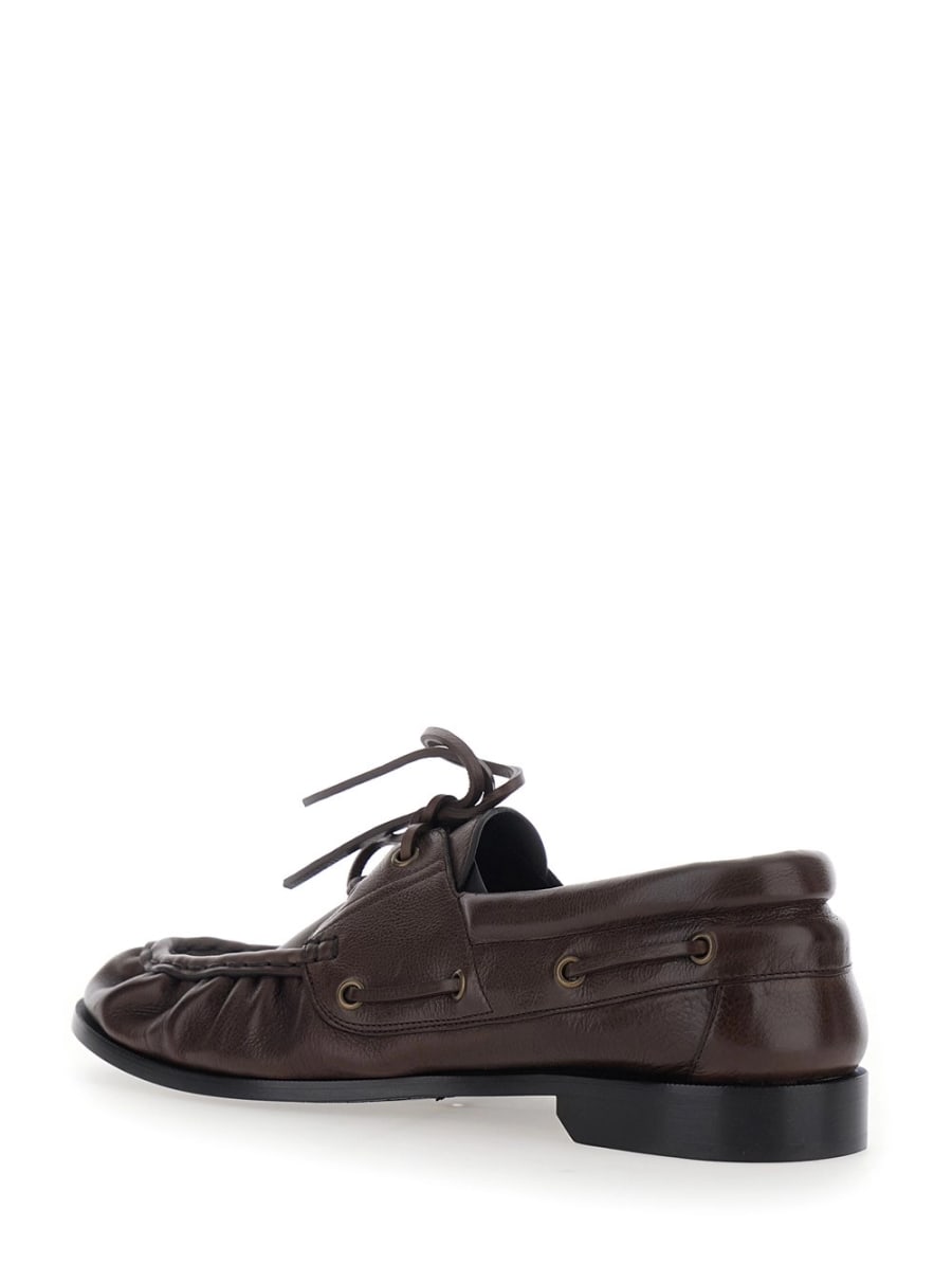 Saint Laurent Mocassini da barca 'Le Loafer Bateau' con Punta Moc Cucita a Mano e Placca Cassandre in Pelle martellata marroni uomo, view 3