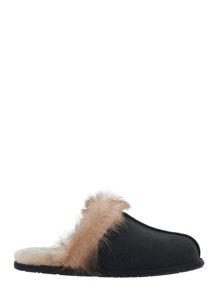 UGG Mule con interno in pelliccia in pelle nere donna