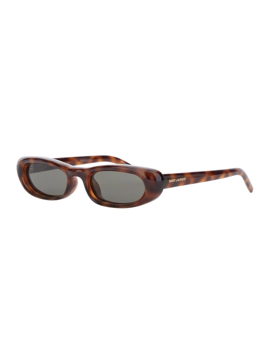 Saint Laurent Occhiali da sole '557' con design cat-eye animalier e logo lettering sulle aste in acetato marroni donna