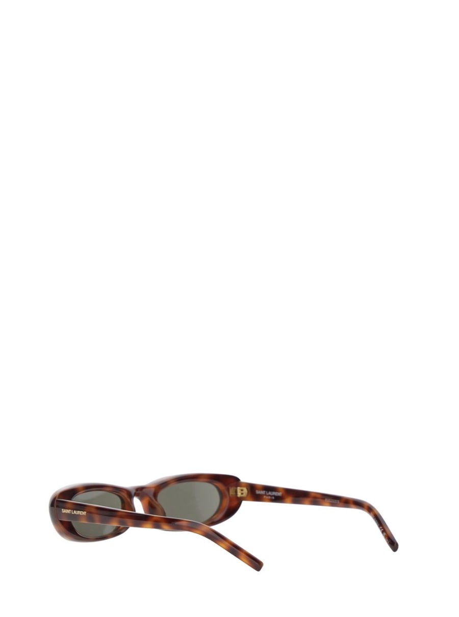 Saint Laurent Occhiali da sole '557' con design cat-eye animalier e logo lettering sulle aste in acetato marroni donna, view 2