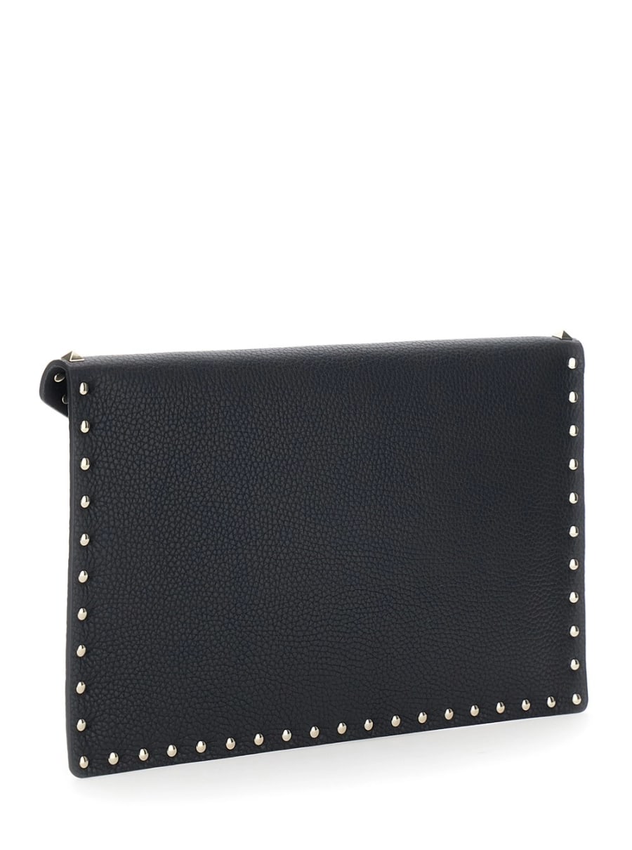 Valentino Garavani Clutch con design a busta e decorazione Rockstud in pelle nera donna, view 3