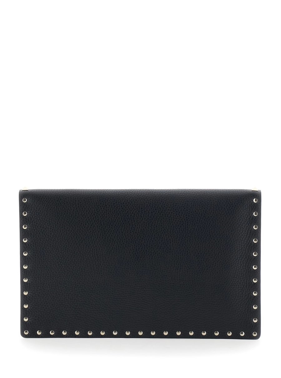 Valentino Garavani Clutch con design a busta e decorazione Rockstud in pelle nera donna, view 4