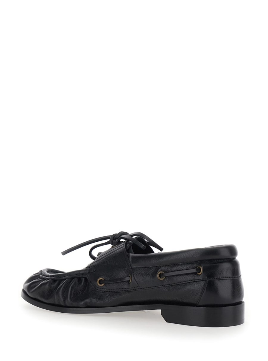 Saint Laurent Mocassini da barca 'Le Loafer Bateau' con Punta Moc Cucita a Mano e Placca Cassandre in Pelle martellata neri uomo, view 3