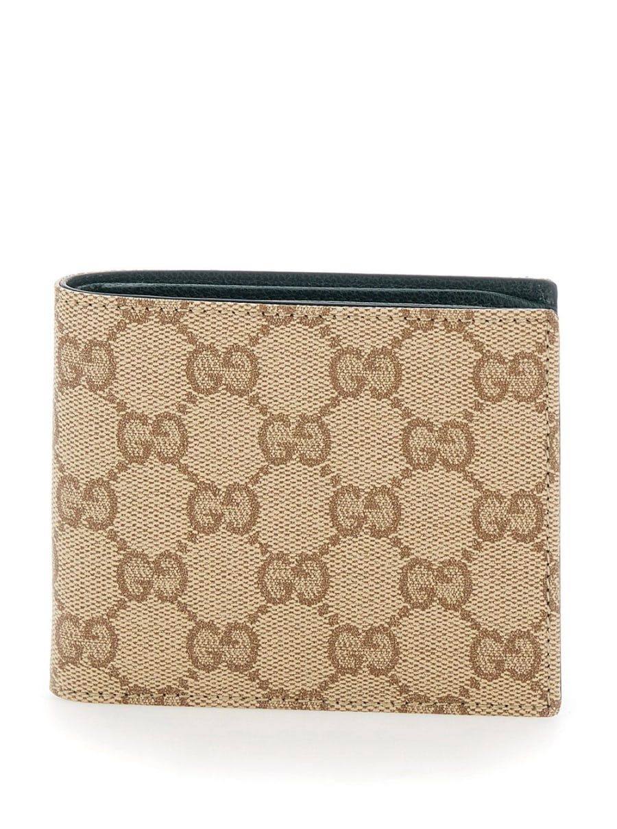 Gucci Portafoglio con logo lettering all'interno in tessuto GG beige uomo