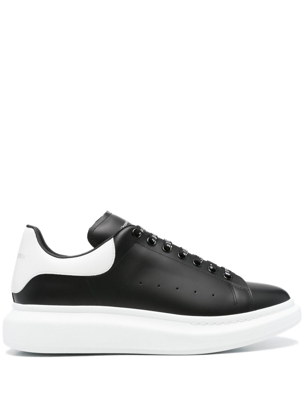 Alexander McQueen Sneakers nere con suola e linguetta sul tallone bianca